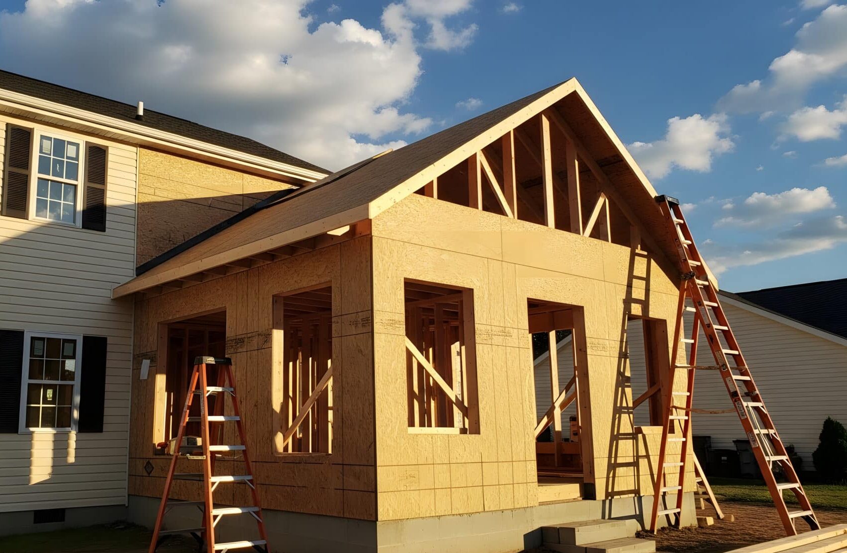 New home construction with addition and framing visible